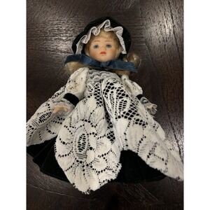 Vintage 7 1/2 In. Victorian Porcelain Doll Blonde With Green Velvet Dress & Lace